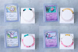 Pokémon TCG Playing Card with Inspired Crystal Bracelet