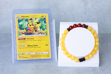 Pokémon TCG Playing Card with Inspired Crystal Bracelet